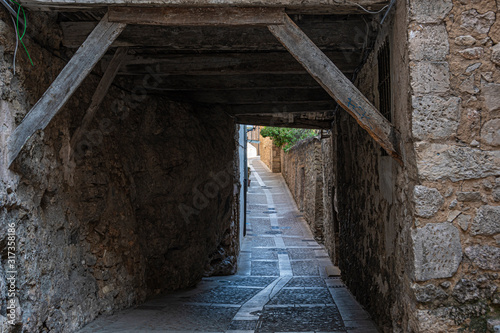Typical medieval alley in Cuenca city. Community of Castilla la Mancha. Spain