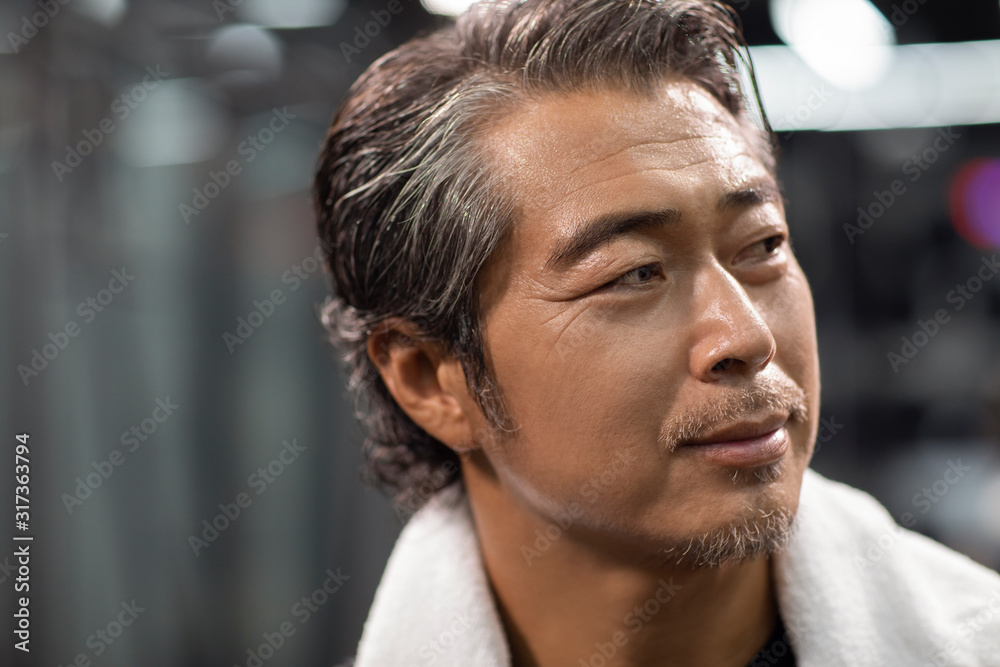 Mature man working out at gym Mature man working out at gym