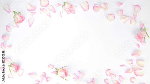 Valentine's day, Mother's day , love background - Frame made of pink roses, petals, leaves isolated on white texture, top view with space for text