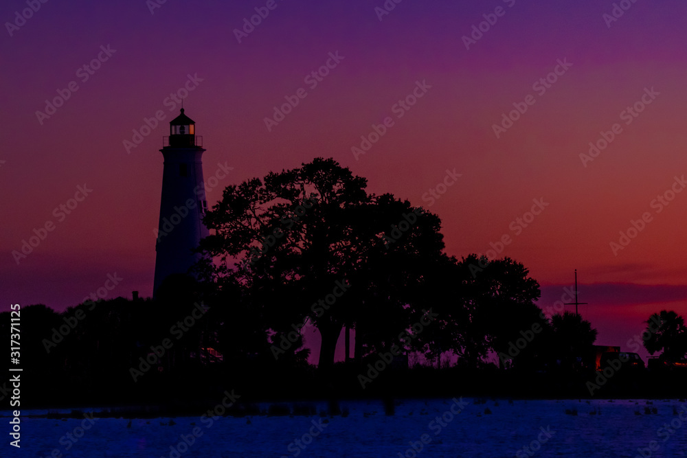 St. Mark's Lighthouse in Crawfordville, Florida as the sunsets over the Gulf of Mexico on December 18, 2019.