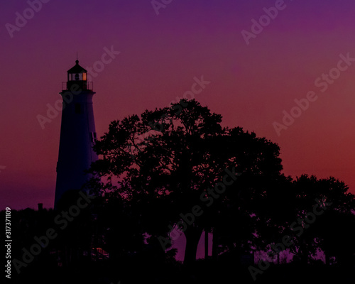 St. Mark's Lighthouse in Crawfordville, Florida as the sunsets over the Gulf of Mexico on December 18, 2019.