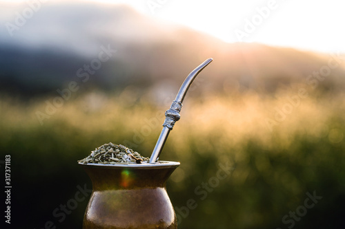 Chimarrão, or mate, is a characteristic drink of the culture of southern South America bequeathed by indigenous cultures. It consists of a gourd, a pump, ground yerba mate and warm water.