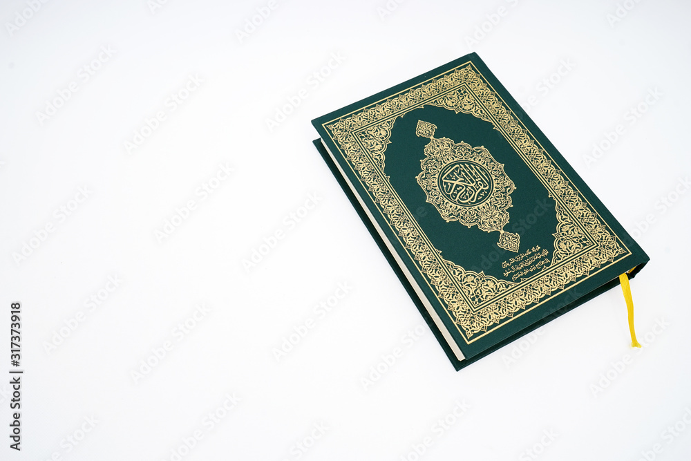 Holy book of Muslims - Koran - quran on white background Holy book of Muslims - Koran - quran on white background