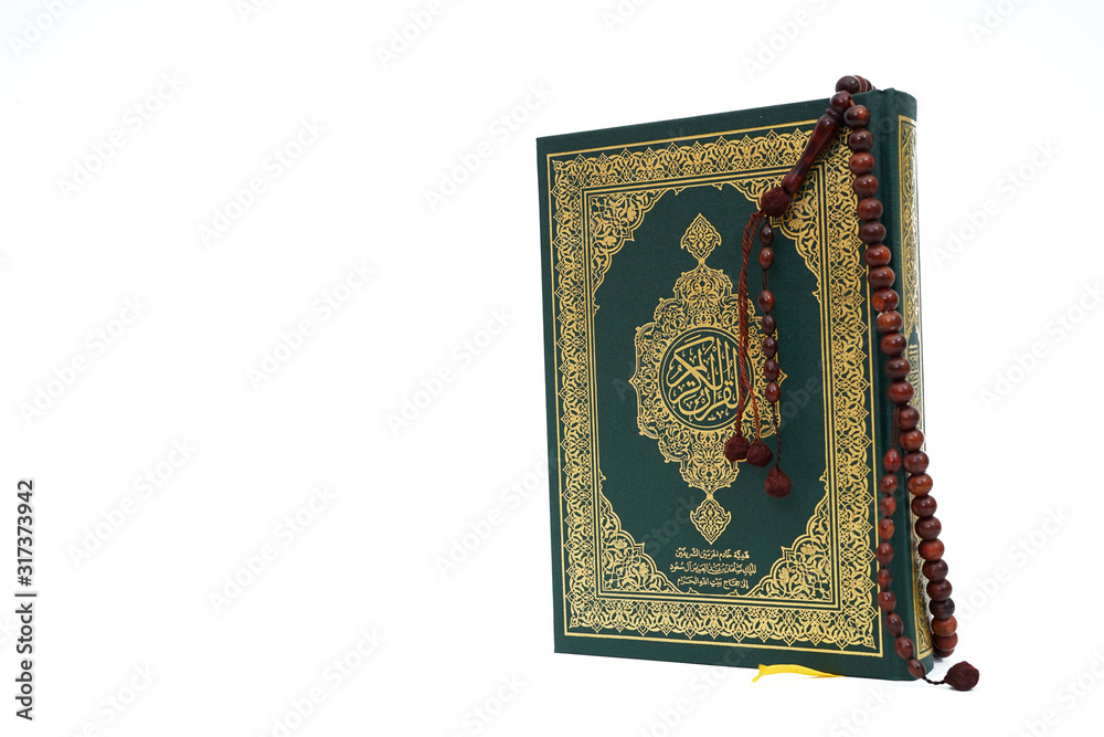 Holy book of Muslims - Koran - quran on white background Holy book of Muslims - Koran - quran on white background