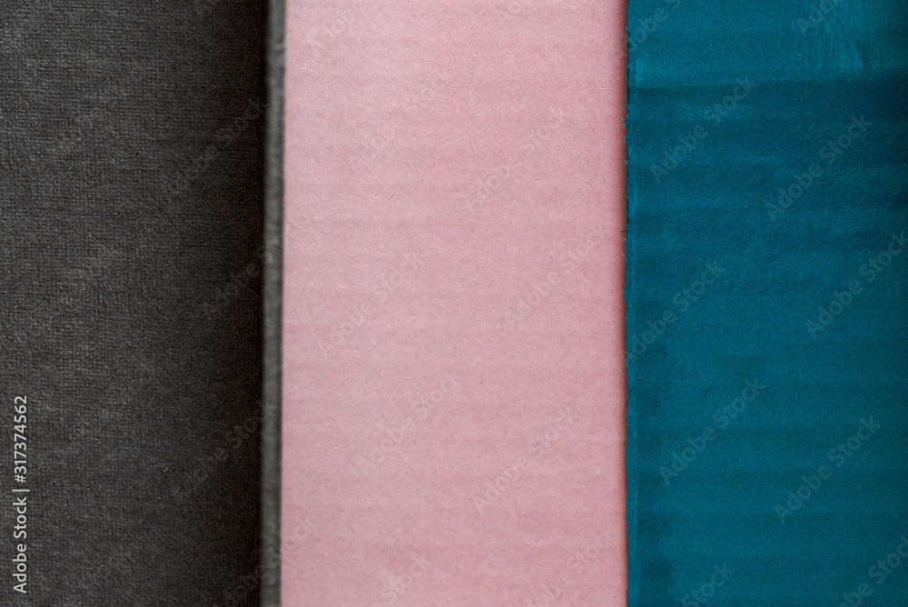 Fototapeta premium pink, blue and dark gray background showing different textures made with cartons