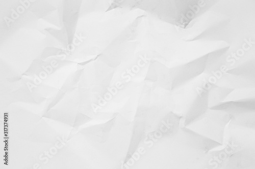 Clean white paper, wrinkled, abstract background.