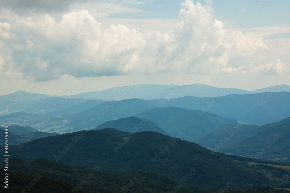 View from Tarnica peak, mountain ranges in blue, Bieszczady Mountains Poland