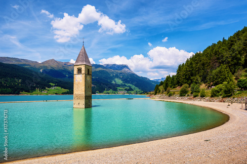Fototapeta Naklejka Na Ścianę i Meble -  Church in the lake Reschen bell tower, South Tyrol, Italy