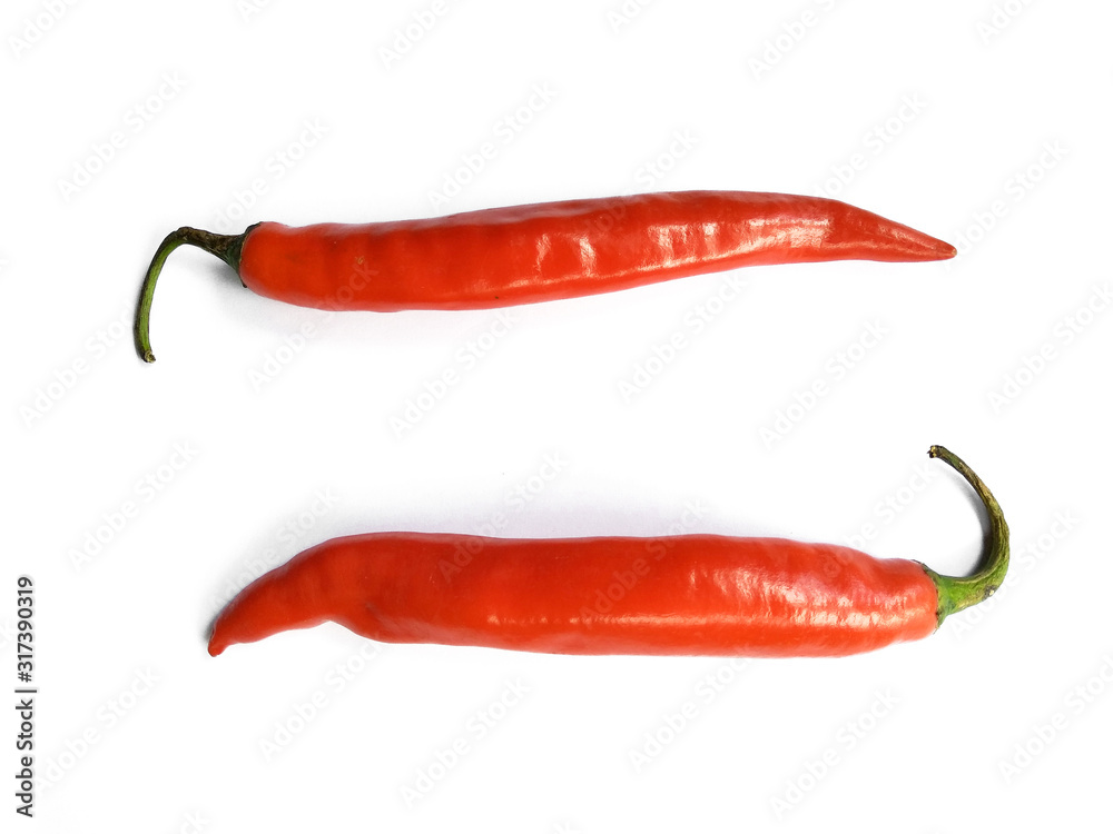 Chili pepper isolated on a white background with clipping path. Hot red chili pepper on white background. Chili pepper isolated on a white background with clipping path. Hot red chili pepper on white background.