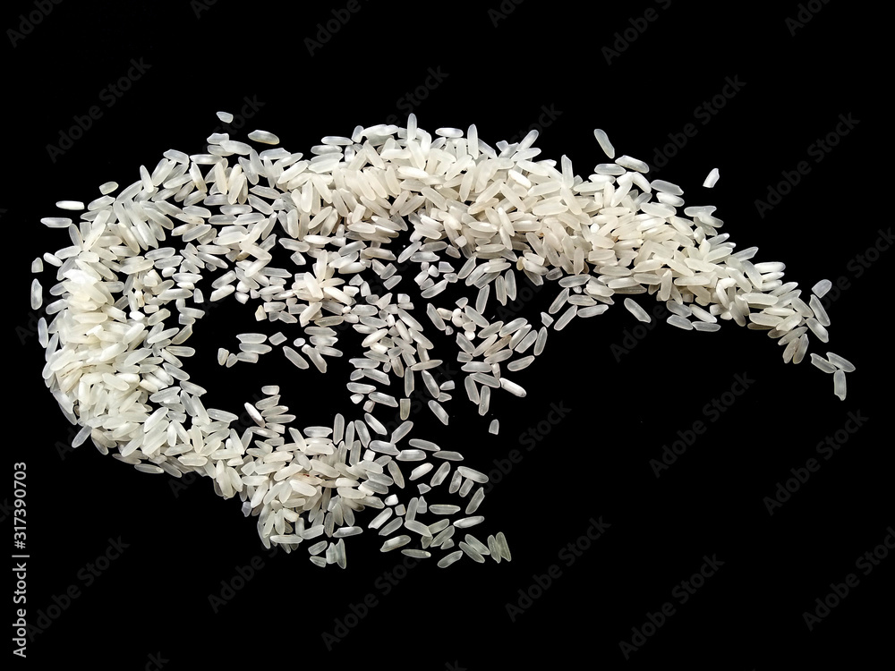 Abstract rice cloud and white rice explosion isolated on black background. pile rice isolated on black background. Abstract rice cloud and white rice explosion isolated on black background. pile rice isolated on black background.