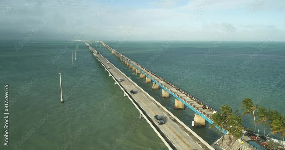 Aerial View of Seven Mile Bridge in The Florida Keys on a Beautiful Day With Beautiful Turquoise Water Tracking Right Aerial View of Seven Mile Bridge in The Florida Keys on a Beautiful Day With Beautiful Turquoise Water Tracking Right