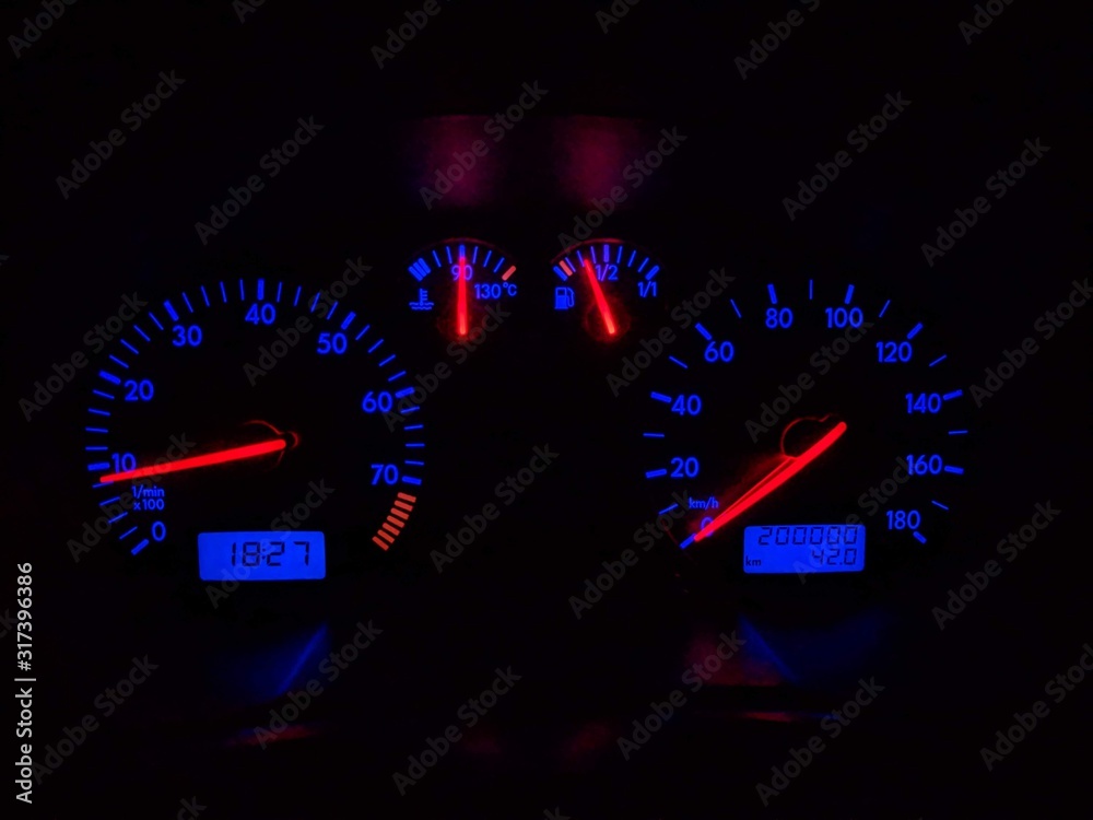speedometer and tachometer car dashboard