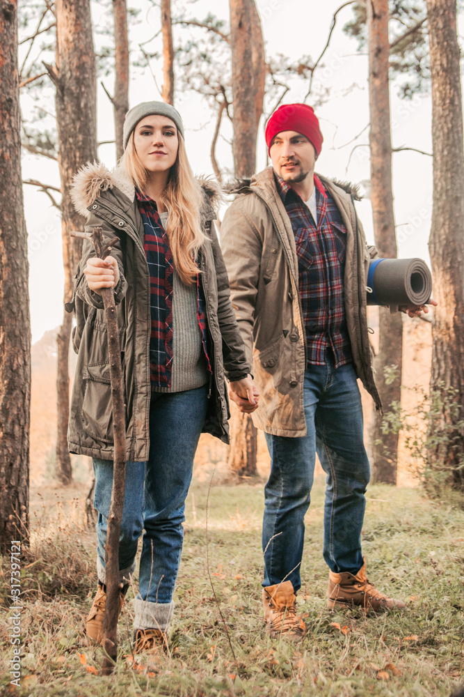 Traveler couple exploring highlands. Freedom and active lifestyle concept.