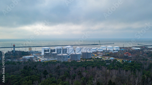 Aerial view white oil tank, storage of oil and petrochemical products ready for logistic and transport business
