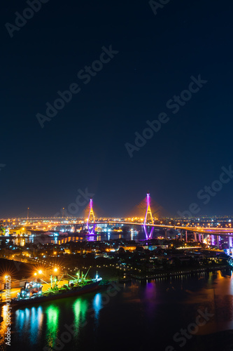 Bhumibol suspension bridge over Chao Phraya River at night in Bangkok city, Thailand © geargodz