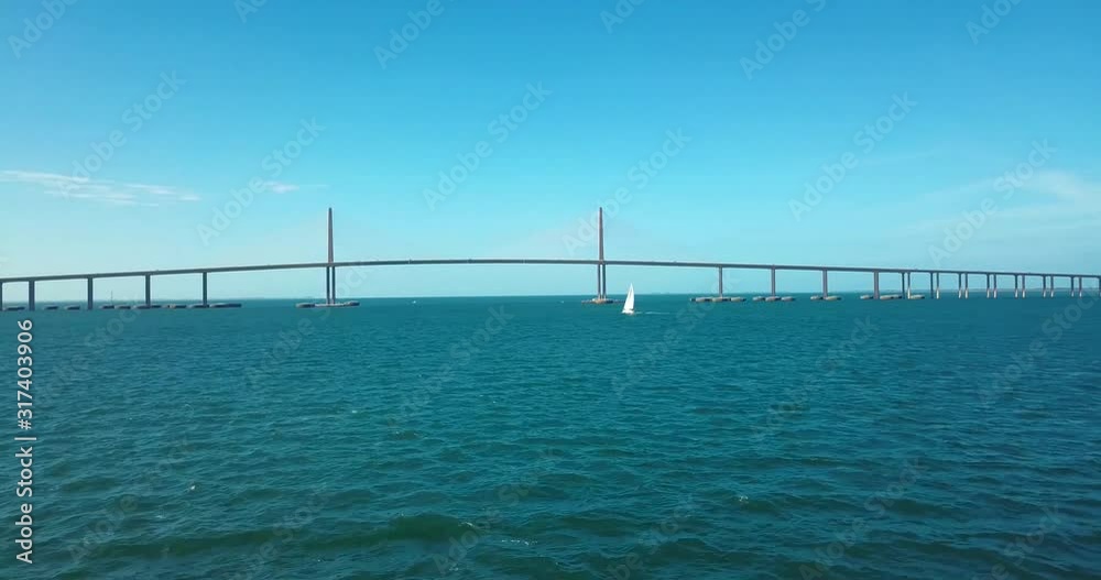 4K Aerial Video of Sailboat in Shipping Channel Under Sunshine Skyway Bridge 4K Aerial Video of Sailboat in Shipping Channel Under Sunshine Skyway Bridge