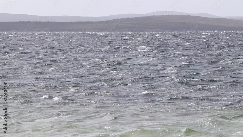White caps, waves and rough sea on a windy, stormy day in South Australia in cinematic slow motion White caps, waves and rough sea on a windy, stormy day in South Australia in cinematic slow motion