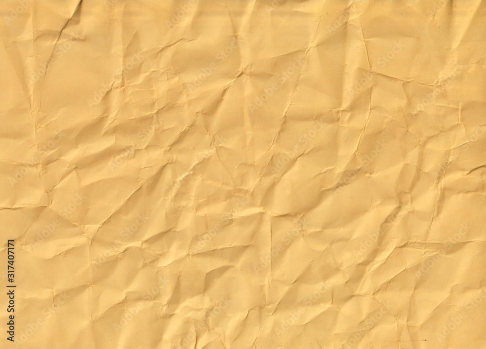 close up crumpled yellow paper close up crumpled yellow paper