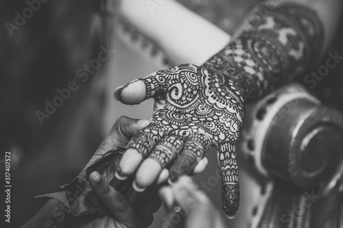 Indian bride's wedding henna mehendi mendi hands close up photo