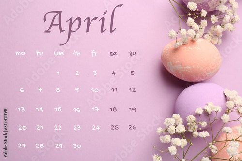 Easter eggs with flowers an...