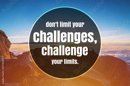 Inspirational and Motivational Quote. Don't Limit Your Challenges, Challenge Your Limits. Mountain Top Background.