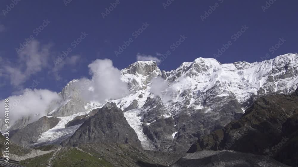 Time lapse of Himalaya peak, Cloud. Beautiful nature time lapse. Himalaya time-lapse beautifully captured. Uttarakhand, India. Timelapse of Kedarnath dome peak behind Kedarnath Temple in Garhwal range Time lapse of Himalaya peak, Cloud. Beautiful nature time lapse. Himalaya time-lapse beautifully captured. Uttarakhand, India. Timelapse of Kedarnath dome peak behind Kedarnath Temple in Garhwal range