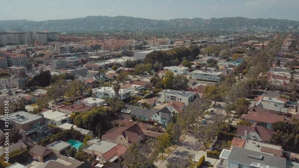 Aerial Drone 4K View of Miracle Mile Los Angeles California Residential Homes near Highland and Wilshire Blvd with Beautiful View of Mountains Aerial Drone 4K View of Miracle Mile Los Angeles California Residential Homes near Highland and Wilshire Blvd with Beautiful View of Mountains