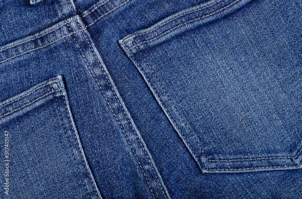 Blue cotton jeans texture background with copy space. Blue cotton jeans texture background with copy space.