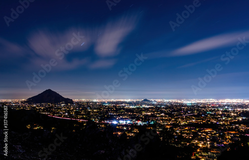 Night shot of Camelback Mountain and southeastern Phoenix, AZ as seen from Piestewa Peak Park