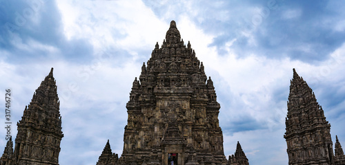 Frog eye view of the three main temples at the Prambanana Temple complex. The left one is dedicated to Brahma, the middle one to Shiva (Siwa), and the right one to Vishnu (Wisnu). photo