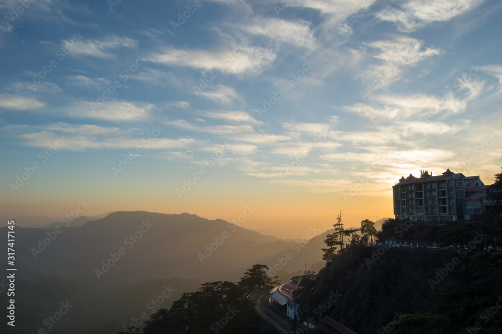 Colorful sunset at the hills in Shimla, India