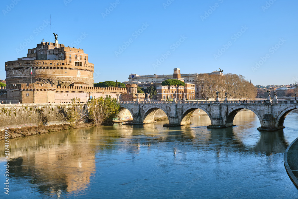 The Castel Sant Angelo and the Sant Angelo bridge in Rome on a sunny winter day