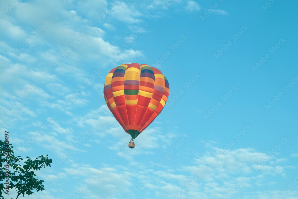Fototapeta premium one colorful balloon in the morning sky