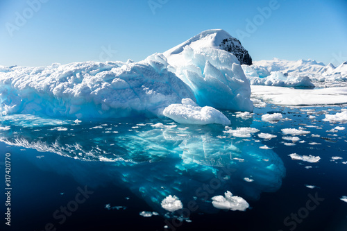 Iceberg floating in the cold water of Antarctica
