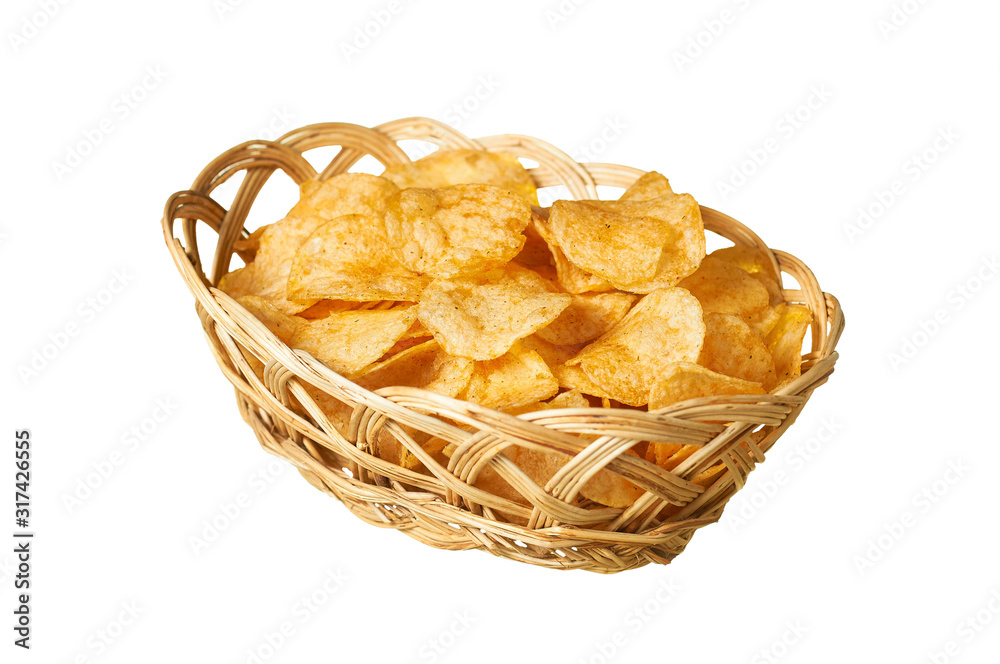 Wooden basket full of spicy fried potato chips isolated on white background without shadow. Close-up Wooden basket full of spicy fried potato chips isolated on white background without shadow. Close-up