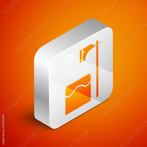 Isometric Executioner axe in tree block icon isolated on orange background. Hangman, torturer, executor, tormentor, butcher, headsman. Silver square button. Vector Illustration