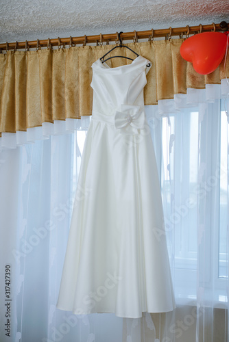 Beautiful vist bride dress in the house. Wedding morning © Sunshine