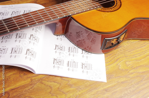 Electric guitar and guitar chords table. Learning to play the guitar.