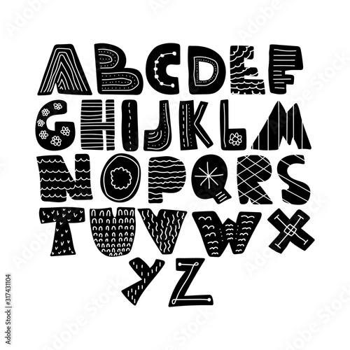 Alphabet hand drawn letters font in folk nordic style. Bold capital letters monochrome with abstract scandinavian ornament. ABC nurcery childish font isolated on white. photo