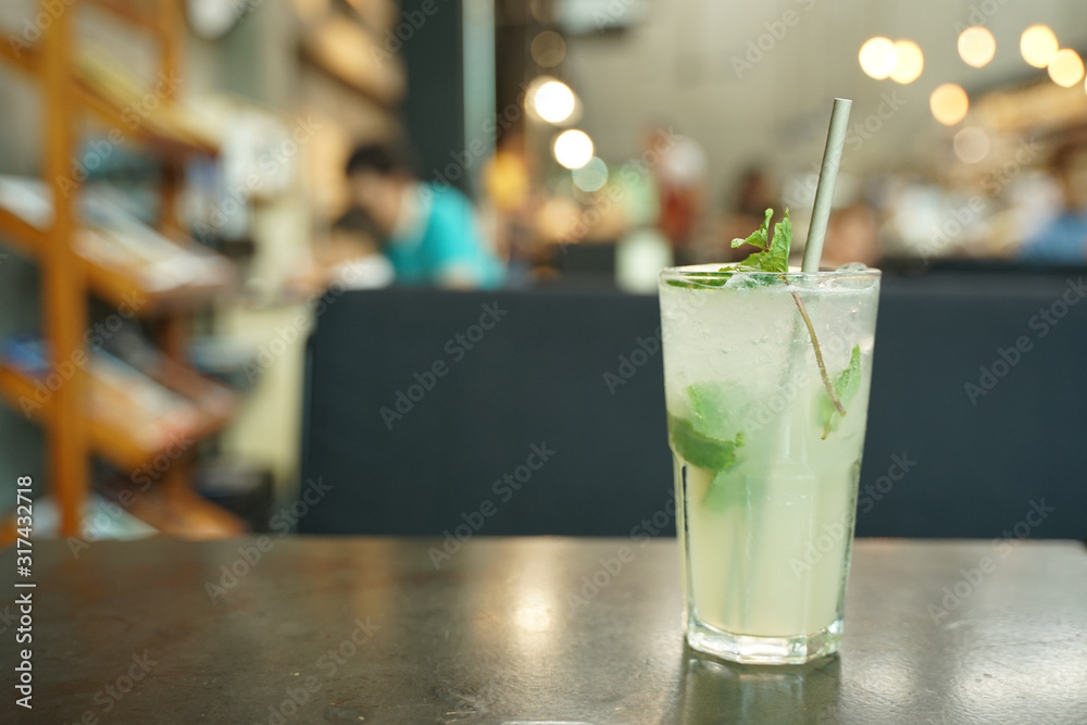 lime soda with fresh lime on clear glass with dark background lime soda with fresh lime on clear glass with dark background