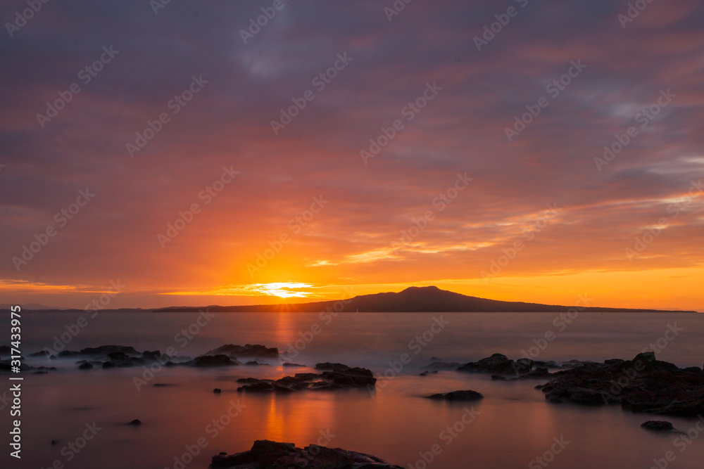 Sunrise over Rangitoto Island from Takapuna, Auckland, New Zealand