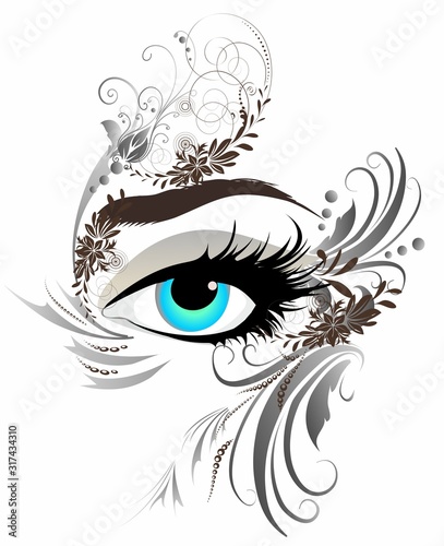 composition with an eye surrounded by decorative gray ornaments
