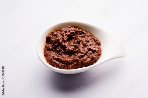 Homemade Tandoori Paste or Marinade mixture, in a bowl. used for grilled chicken or Paneer or vegetable. selective focus