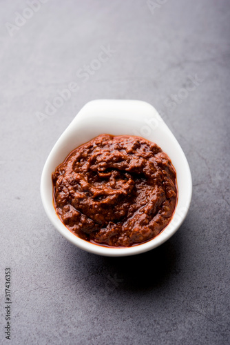 Homemade Tandoori Paste or Marinade mixture, in a bowl. used for grilled chicken or Paneer or vegetable. selective focus