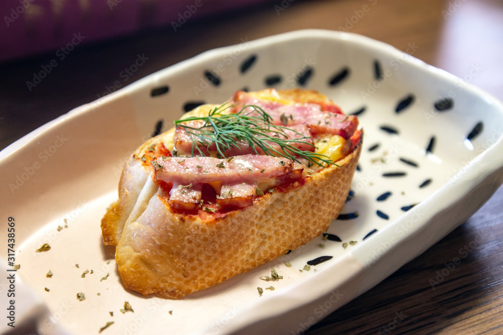 Pizza Baguette with ham and cream cheese