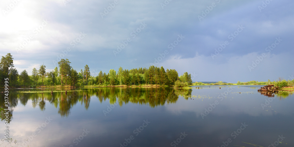Autumn fishing on the Rybinsk Reservoir, beautiful panorama.
