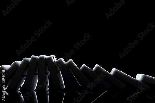 Obraz na plátně White dominoes in the dark close up