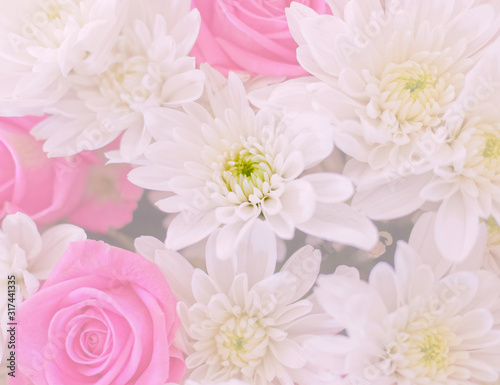 dark pink roses and white chrysanthemums top view  filtered image