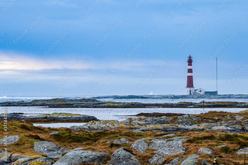 lighthouse on coast of sea in Norway