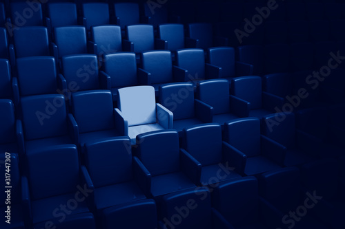 3D rendering auditorium with one reserved seat toned in trendy Classic Blue color of the Year 2020